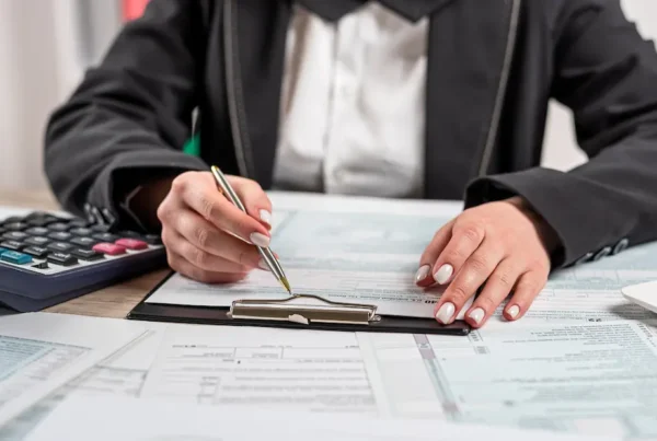 person reviewing deferred tax assets